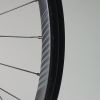 Nieuw MTB logo is licht grijs op een zwarte velg